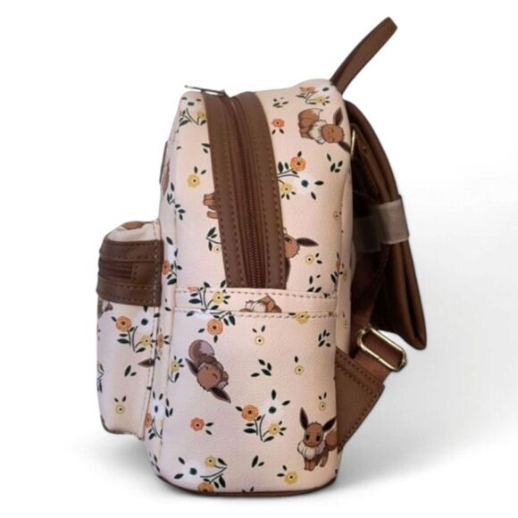 eevee loungefly mini backpack Pokmon : Toys & Games This mini backpack from Pokmon features pastel fruits and Eevee all over  Ready to evolve your